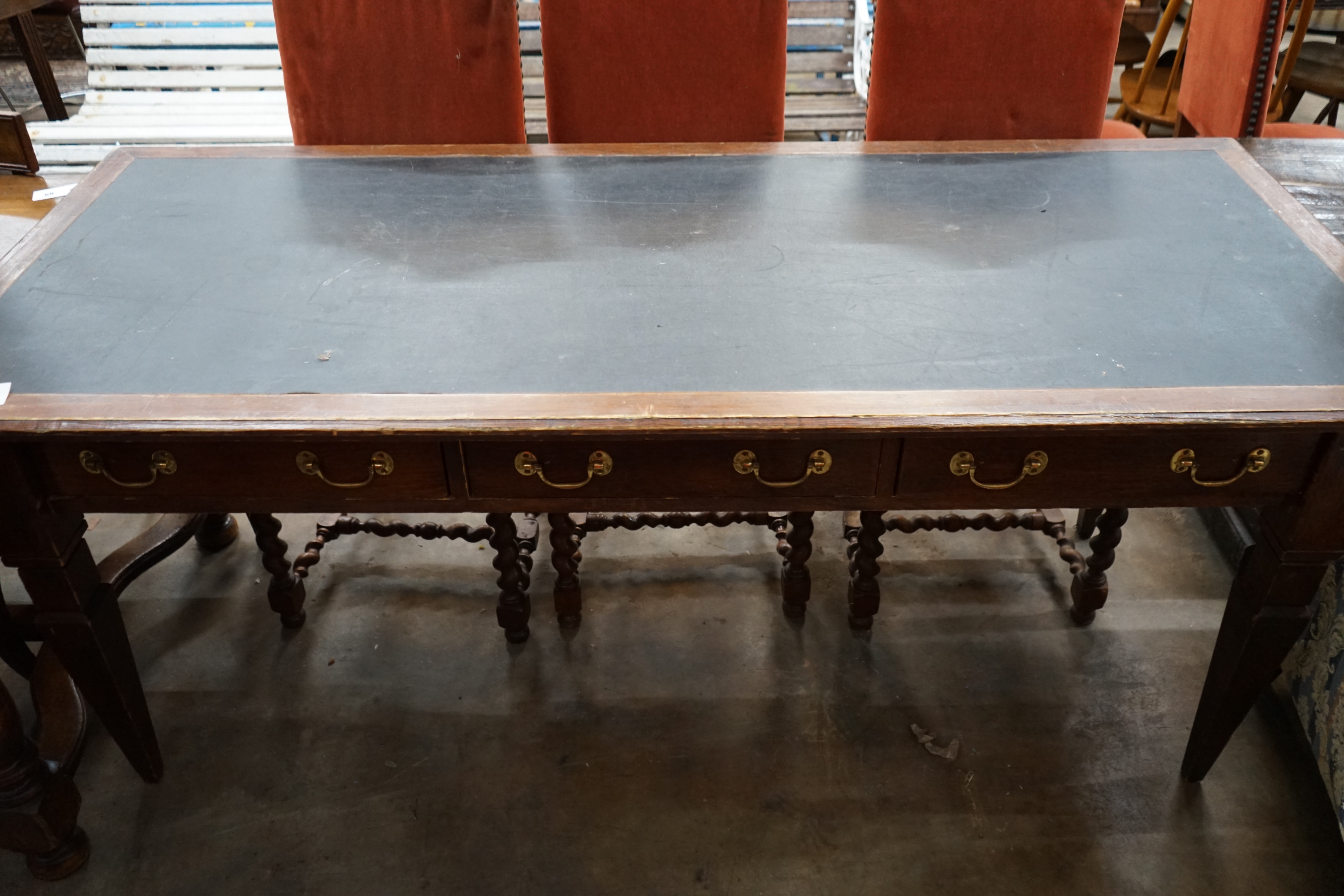 An early 20th century rectangular mahogany three drawer library table, width 190cm depth 79cm height 80cm